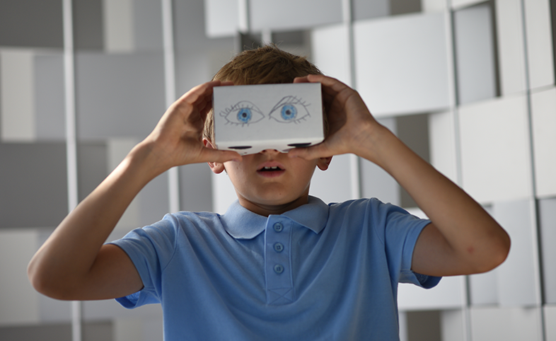 Child using VR headset