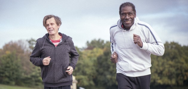 Two men running to improve their health