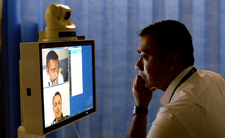 Clinician talking to paramedic stroke telemedicine partnership