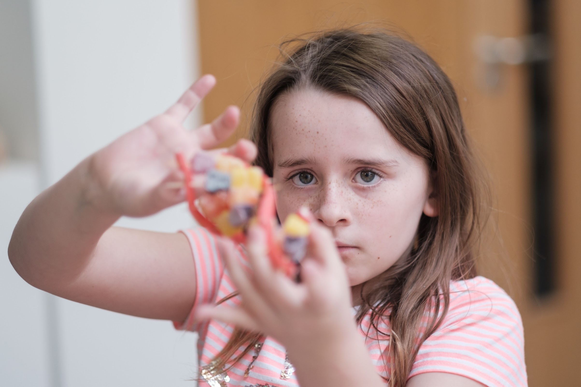 CRDN girl with rare disease holding double helix